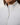 TravisMathew Soft Quilted Full Zip Jacket in Heather Light Grey, close-up of partially open collar and front zipper.