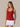 Front view of the J. Pritchard Women's Drift Tank in Deep Crimson on a model with a white pleated skirt.