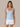 Front view of the J. Pritchard Women's Drift Tank in Heather Sky Blue on a model, showing its scoop neckline.