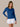 Angled front view of the J. Pritchard Women's Long Sleeve Drift Tee in Open Ocean on a model.
