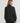 Back view of the Varley Macie Zip Hem Sweat in Black, showing its raglan sleeves, relaxed silhouette and ribbed cuffs.