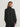 Back view of the Varley Macie Zip Hem Sweat in Black, showing its raglan sleeves, relaxed silhouette and ribbed cuffs.