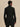 Back view of the black Varley Anset Jacket, showing its fitted waist, long sleeves and hip-covering length.