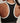 Close-up of the Varley Always Jay Bra in Black/Snow White, showing white racerback trim and a small Varley logo