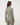 TravisMathew Pulse Half Zip in Olive Smoke, back view showing fitted silhouette and stand collar.