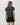 Back view of the Vuori Energy Classic Tee in Hemlock Heather, showing its short sleeves and small upper-back