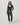 Full-length front view of the Vuori Halo cardigan in Hemlock Heather styled with matching drawstring joggers.